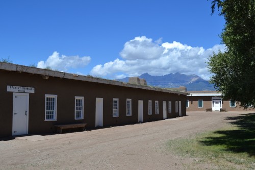 Infantry Barracks building at Fort Garland. Little Bear, Blanca, and Lindsey Peaks in the distance.