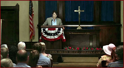 Vampire Bill speaking to the Bon Temps Descendants of the Glorious Dead meeting on *True Blood*