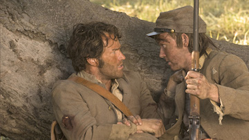 Bill (still human) tries to convince Tolliver Humphreys to stay put during a Civil War battle on *True Blood*